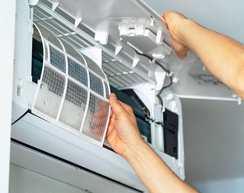 Panel open on wall mounted air conditioning unit to repair